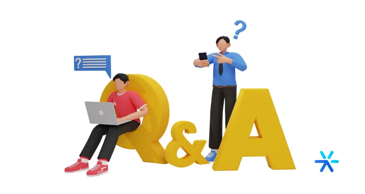 Two man working around big letters: Q and A. 
